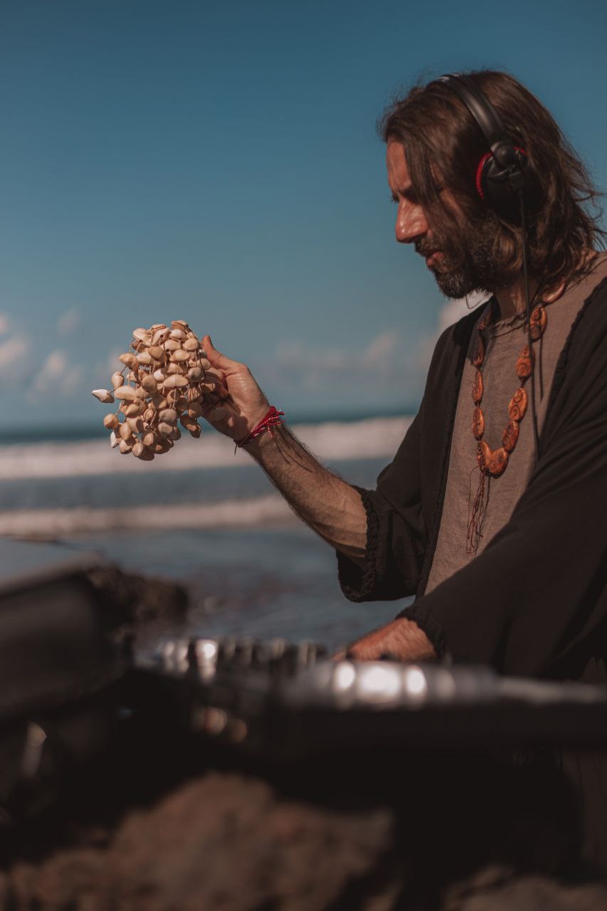 Ivailo Blagoev performing at the shoreline at dawn
